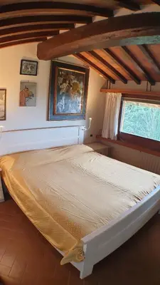 Letto o letti in una camera di Poggio Paradiso