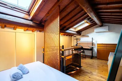 Letto o letti in una camera di La Casina - Florence Loft Apartment