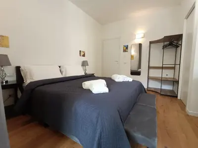 Letto o letti in una camera di Festina Lente Suites 1