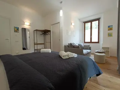 Letto o letti in una camera di Festina Lente Suites 1