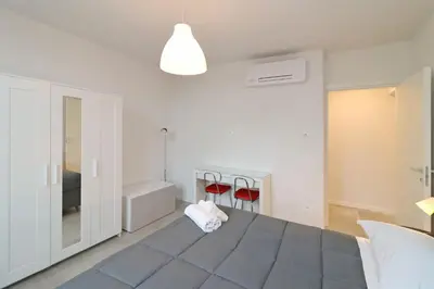 Letto o letti in una camera di Suite Rose
