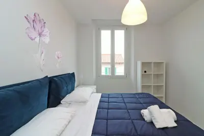 Letto o letti in una camera di Suite Rose
