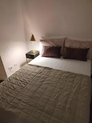 Letto o letti in una camera di Suite Ottocento