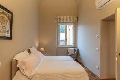 Letto o letti in una camera di Maison San Niccolò Always Florence Collection