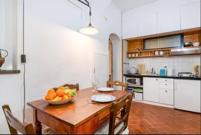 Cucina o angolo cottura di Apartment Magnoli&Ponte Vecchio