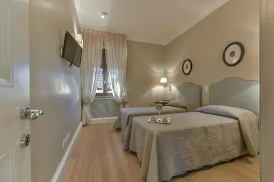 Letto o letti in una camera di Lanfredini Firenze