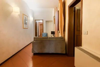 Letto o letti in una camera di Apartments Florence- Ariento Bacco 3bdr San Lorenzo