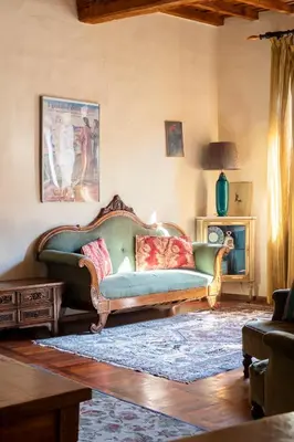 Area soggiorno di Caravaggio House 2 Suite Private nell'Oltrarno Artistico