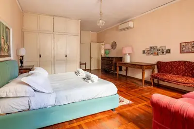 Letto o letti in una camera di Caravaggio House 2 Suite Private nell'Oltrarno Artistico