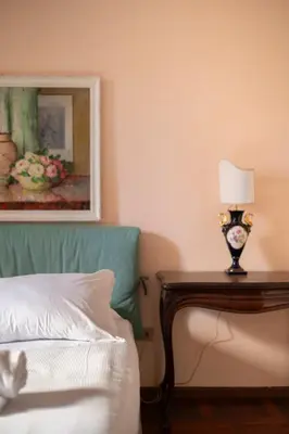 Letto o letti in una camera di Caravaggio House 2 Suite Private nell'Oltrarno Artistico