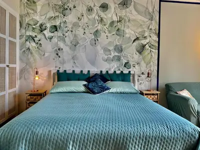 Letto o letti in una camera di Perla JS