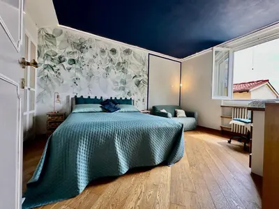 Letto o letti in una camera di Perla JS