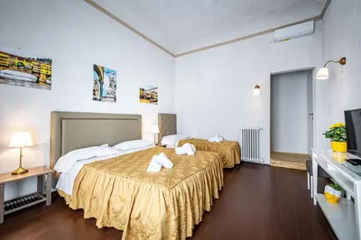 Letto o letti in una camera di La Loggia del Porcellino