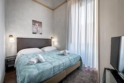Letto o letti in una camera di La Loggia del Porcellino