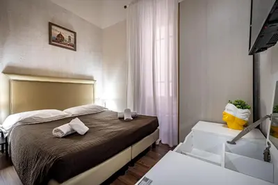 Letto o letti in una camera di La Loggia del Porcellino