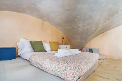 Letto o letti in una camera di Alice Apartment By San Firenze Collection