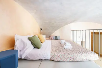 Letto o letti in una camera di Alice Apartment By San Firenze Collection