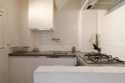 Cucina o angolo cottura di Ponte Vecchio Deluxe Apartment