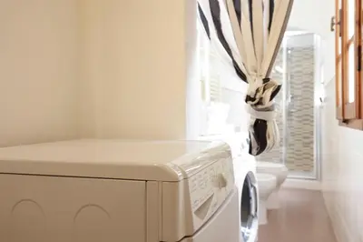 Letto o letti in una camera di Ponte Vecchio Deluxe Apartment