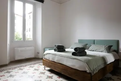 Letto o letti in una camera di Andrea's Home