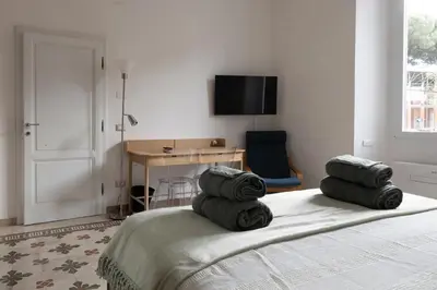 Letto o letti in una camera di Andrea's Home