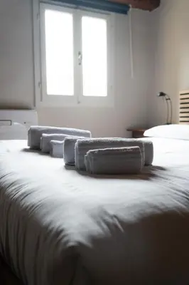 Letto o letti in una camera di Central & Lovely studio