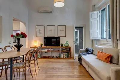 Area soggiorno di Gramsci Apartment by Mamo Florence