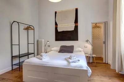 Letto o letti in una camera di Gramsci Apartment by Mamo Florence