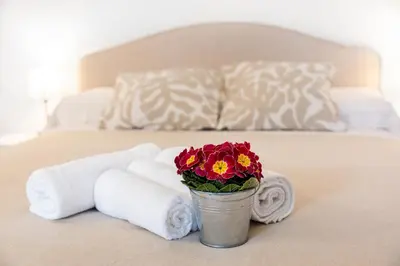 Letto o letti in una camera di Machiavelli Penthouse