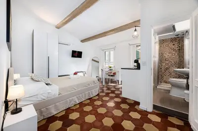 Letto o letti in una camera di Machiavelli Penthouse