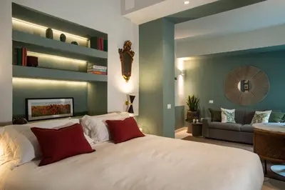 Letto o letti in una camera di TheGreen Florence