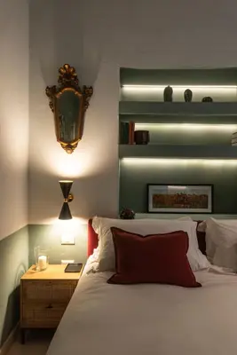 Letto o letti in una camera di TheGreen Florence
