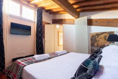 Letto o letti in una camera di Elegant Dome Apartment in the Heart of Florence