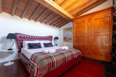Letto o letti in una camera di Elegant Dome Apartment in the Heart of Florence