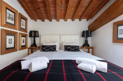 Letto o letti in una camera di Elegant Dome Apartment in the Heart of Florence