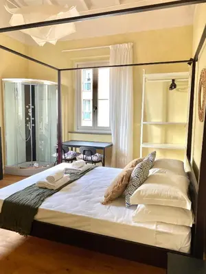 Letto o letti in una camera di Sleep & Go Studios, 5 Min Walk to Uffizi
