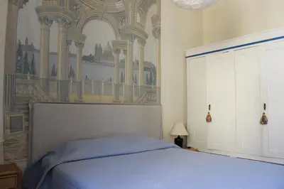 Letto o letti in una camera di Art Apartment Montebello Family Home