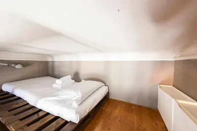 Letto o letti in una camera di Il Rifugio del David by MMega