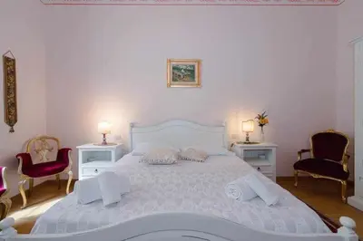 Letto o letti in una camera di Ghibellina Elegant Apartment with 4 bedrooms