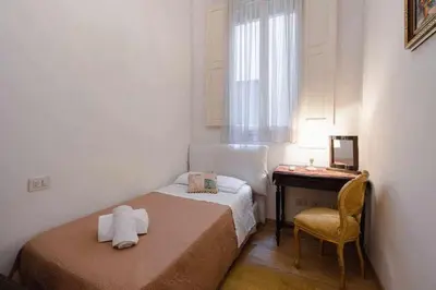 Letto o letti in una camera di Ghibellina Elegant Apartment with 4 bedrooms