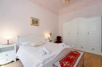 Letto o letti in una camera di Ghibellina Elegant Apartment with 4 bedrooms