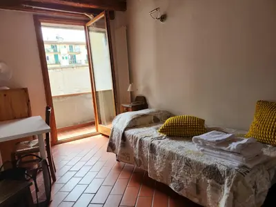 Letto o letti in una camera di Florence center