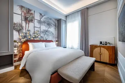 Letto o letti in una camera di Dimora Collection - Le Logge - Historic Boutique Luxury Suites