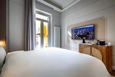 Letto o letti in una camera di Dimora Collection - Le Logge - Historic Boutique Luxury Suites