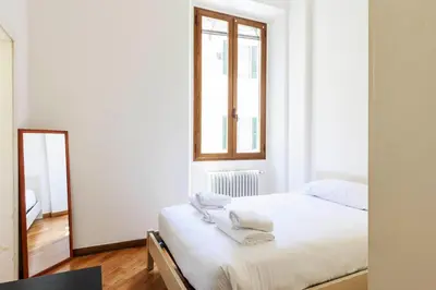 Letto o letti in una camera di Santa Maria Novella Comfort