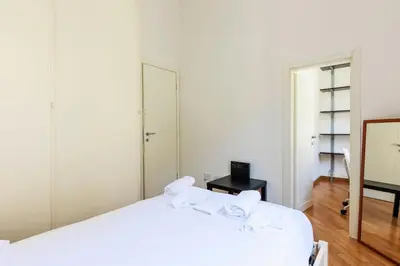 Letto o letti in una camera di Santa Maria Novella Comfort