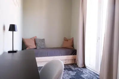 Area soggiorno di Ginny Apartment