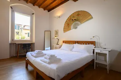 Letto o letti in una camera di Sweet House in Macci Street