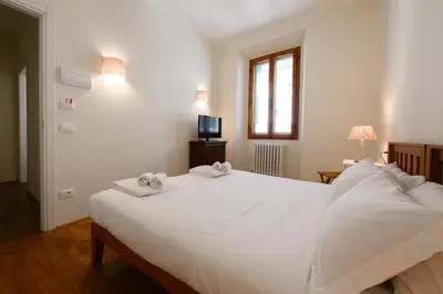 Letto o letti in una camera di Sweet House in Macci Street