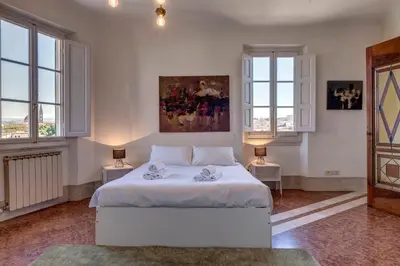 Letto o letti in una camera di Palestro Apartment by Mamo Florence